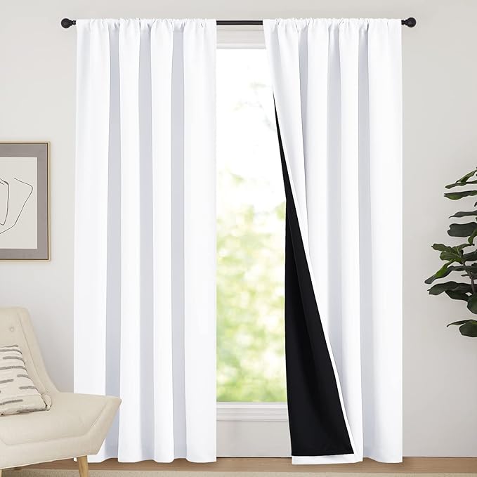 NICETOWN 100% Blackout Curtain Panels, Rod Pocket Window Curtains with Black Liner for Nursery, 84 inches Drop Cold and Full Light Blocking Draperies (White, 2 Pieces, 52 inches Wide Each Panel)