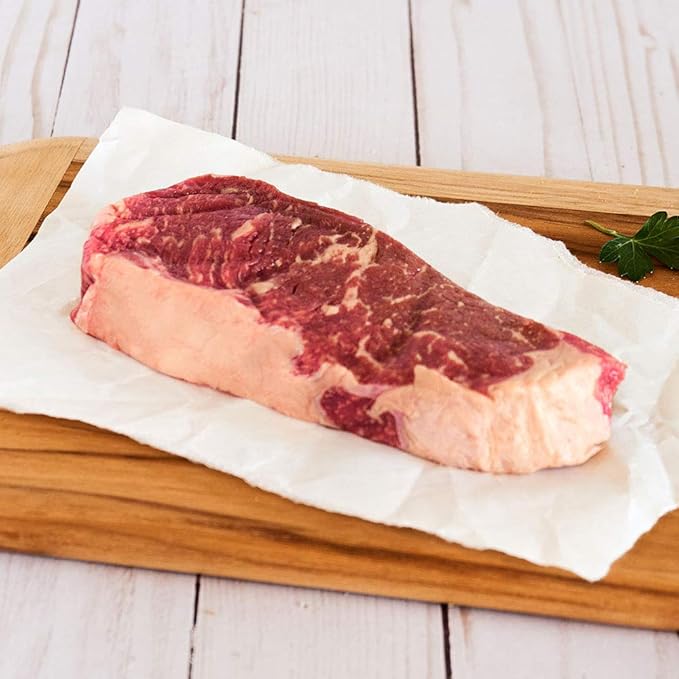 Nebraska Star Beef Prestige Steaks - 12 Packs with Signature Seasoning (12-8oz NY Strips)